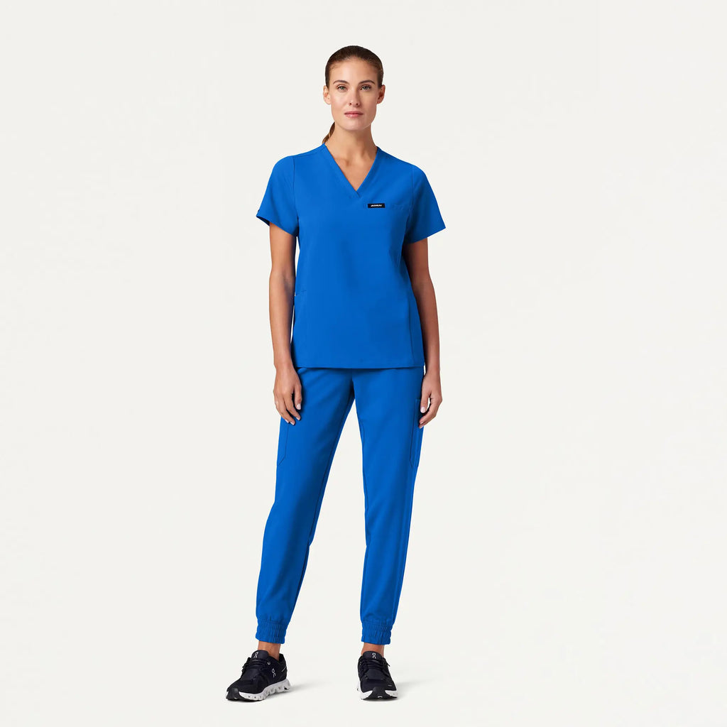 Jaanuu Scrubs Women's Magna 3-Pocket Scrub Top Royal Blue | scrub-supply.com