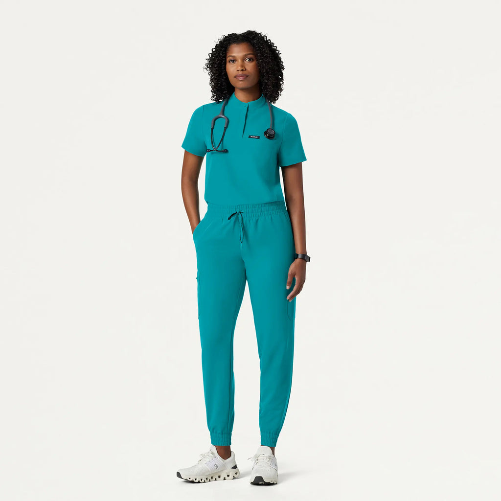 Jaanuu Scrubs Women's Savi Tuck-In Stand-Collar Scrub Top Aqua | scrub-supply.com