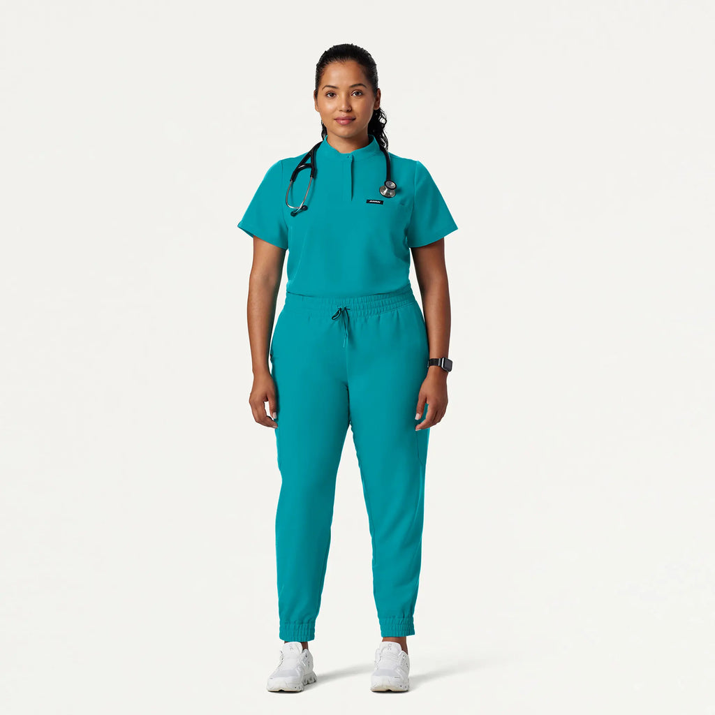 Jaanuu Scrubs Women's Savi Tuck-In Stand-Collar Scrub Top Aqua | scrub-supply.com