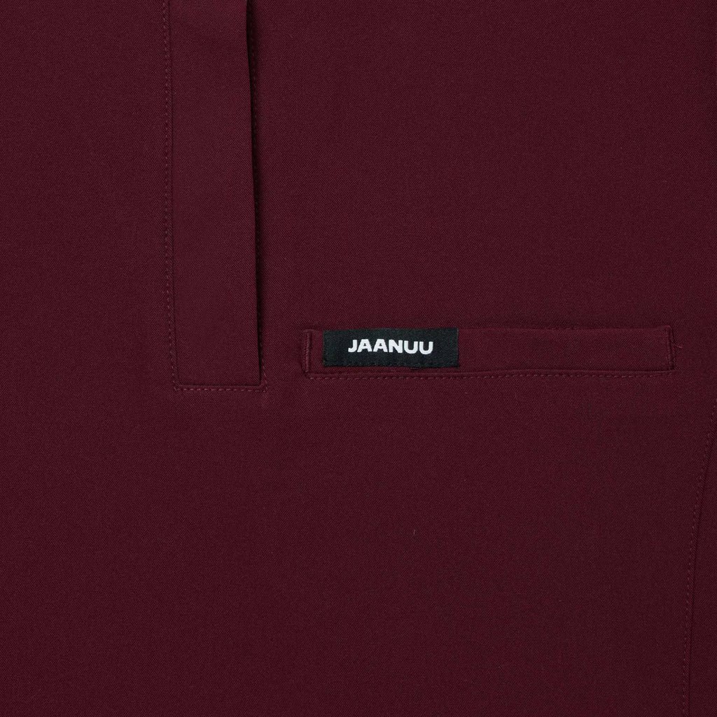 Jaanuu Scrubs Women's Savi Tuck-In Stand-Collar Scrub Top Burgundy | scrub-supply.com