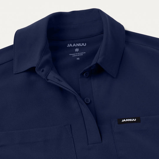 Jaanuu Scrubs Women's Acta Oversized 2-Pocket Scrub Top Midnight Navy | scrub-supply.com