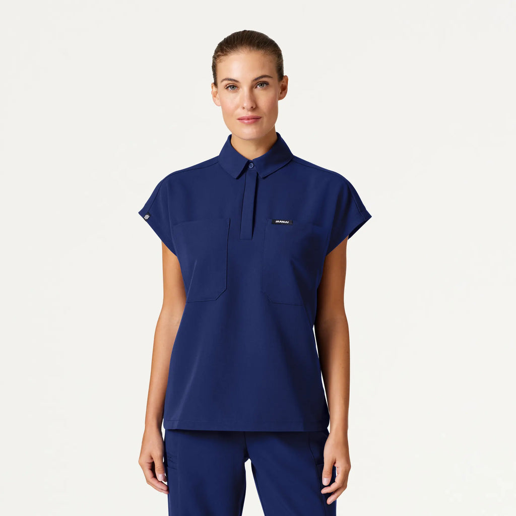 Jaanuu Scrubs Women's Acta Oversized 2-Pocket Scrub Top Navy Blue | scrub-supply.com