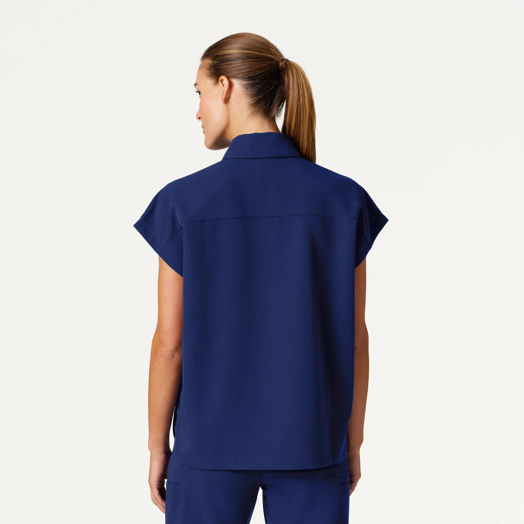 Jaanuu Scrubs Women's Acta Oversized 2-Pocket Scrub Top Navy Blue | scrub-supply.com