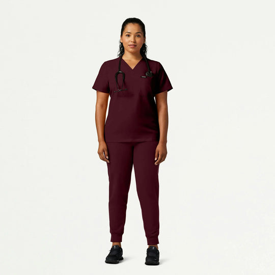 Jaanuu Scrubs Women's Rhena Slim 1-Pocket Scrub Top Burgundy | scrub-supply.com