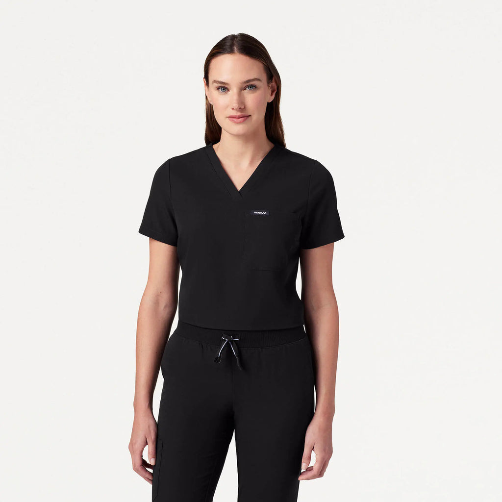 Jaanuu Scrubs Women's Rhena Slim Essential 1-Pocket Scrub Top Black | scrub-supply.com