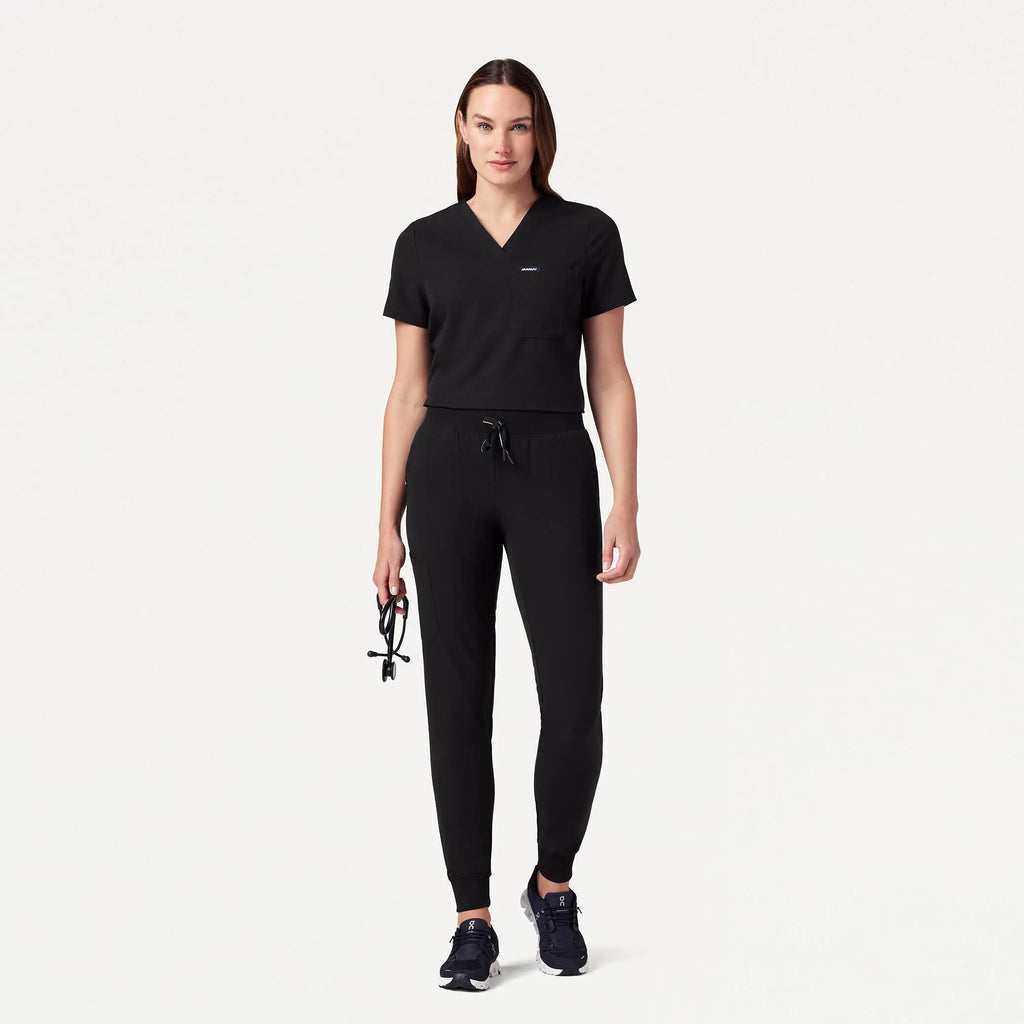 Jaanuu Scrubs Women's Rhena Slim Essential 1-Pocket Scrub Top Black | scrub-supply.com