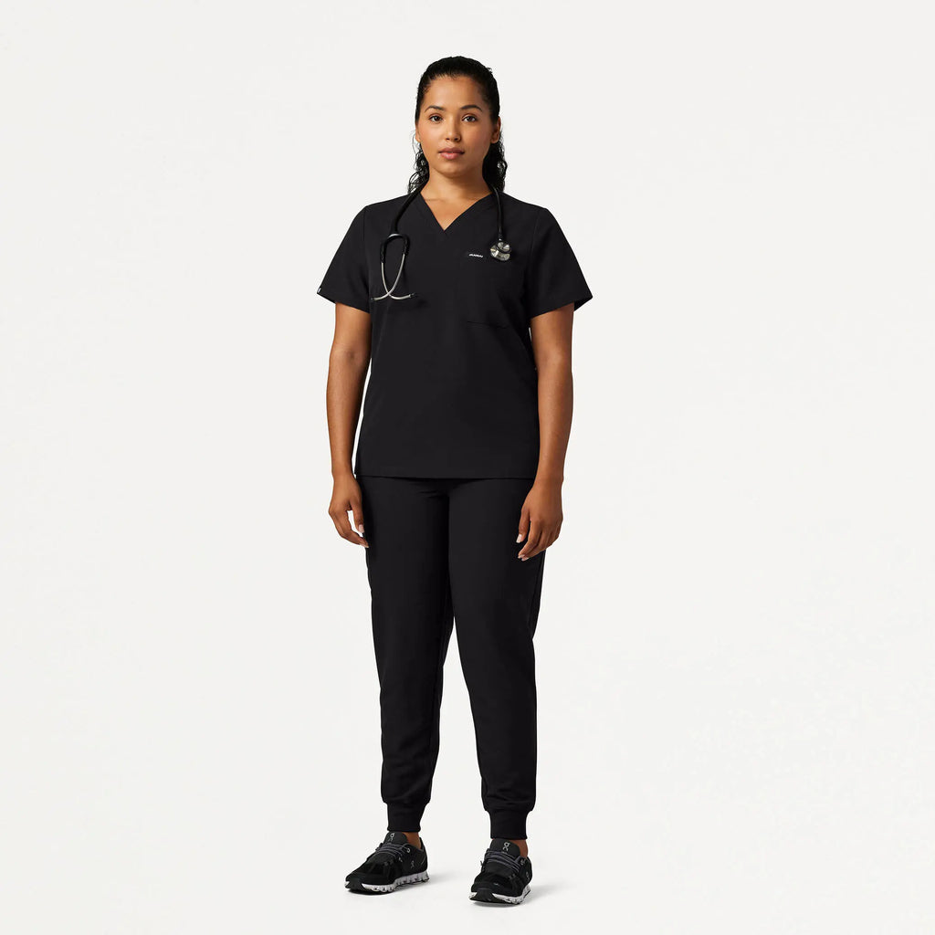 Jaanuu Scrubs Women's Rhena Slim Essential 1-Pocket Scrub Top Black | scrub-supply.com