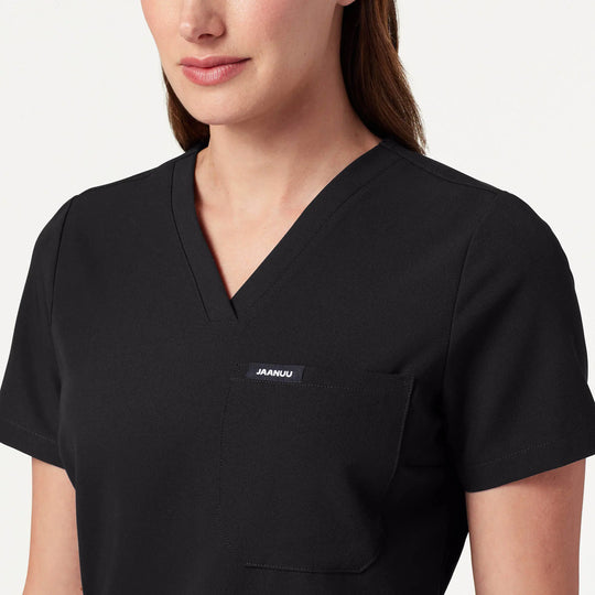Jaanuu Scrubs Women's Rhena Slim 1-Pocket Scrub Top Black | scrub-supply.com
