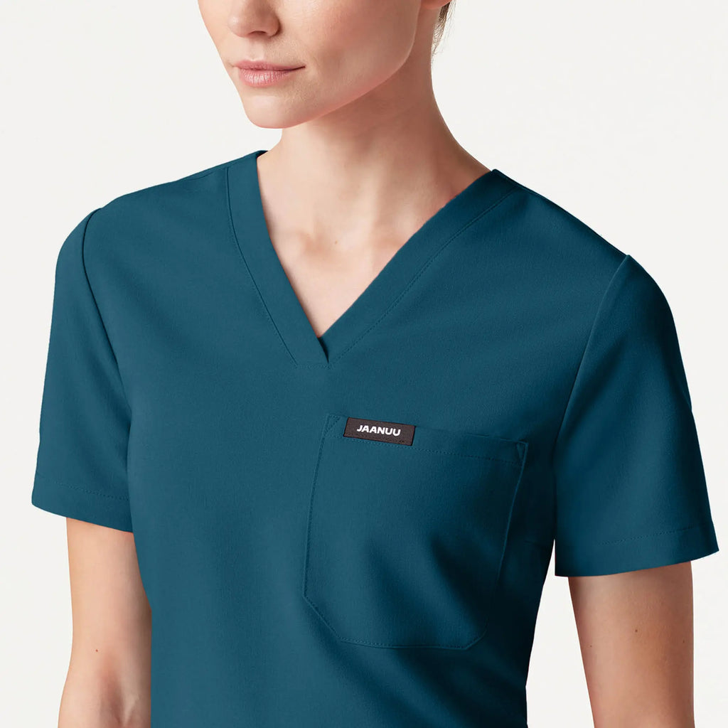 Jaanuu Scrubs Women's Rhena Slim Essential 1-Pocket Scrub Top Caribbean Blue | scrub-supply.com