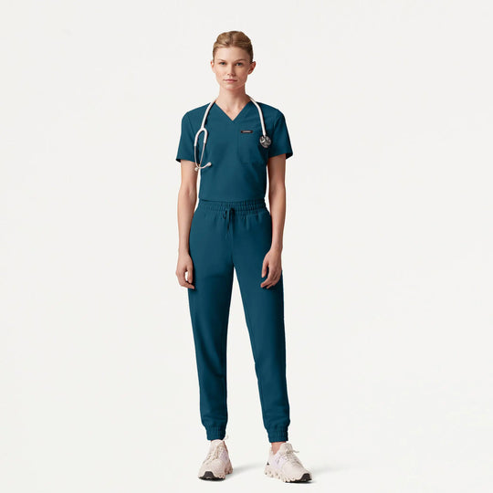 Jaanuu Scrubs Women's Rhena Slim 1-Pocket Scrub Top Caribbean Blue | scrub-supply.com