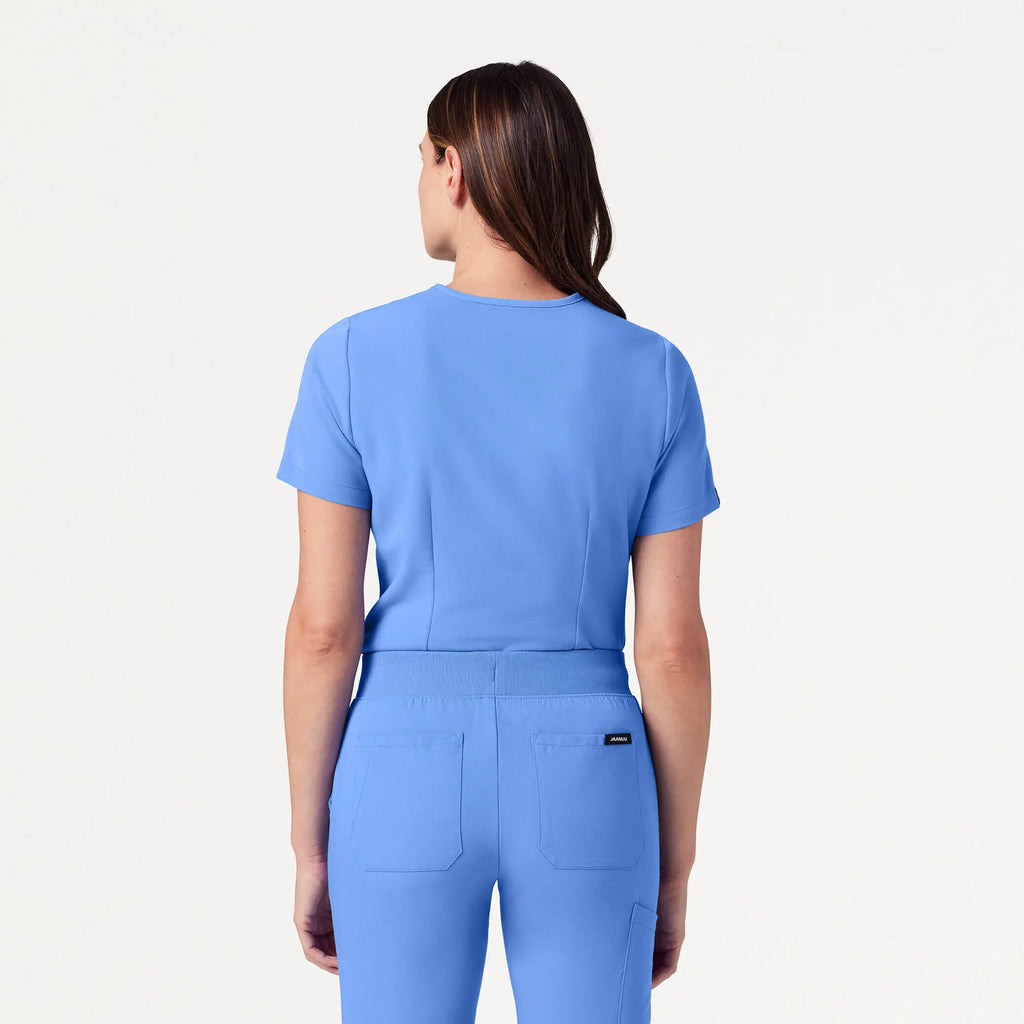 Jaanuu Scrubs Women's Rhena Slim Essential 1-Pocket Scrub Top Ceil Blue | scrub-supply.com