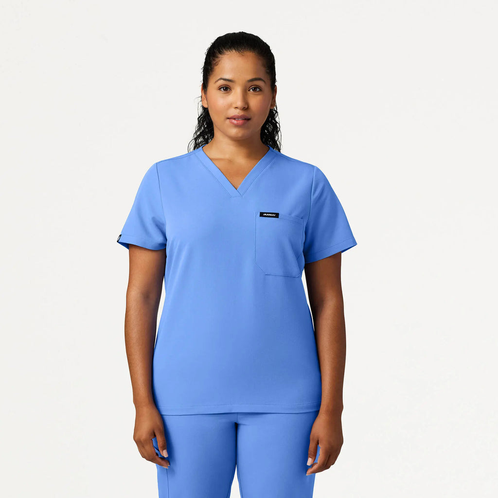 Jaanuu Scrubs Women's Rhena Slim Essential 1-Pocket Scrub Top Ceil Blue | scrub-supply.com