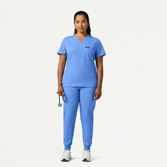 Jaanuu Scrubs Women's Rhena Slim 1-Pocket Scrub Top Ceil Blue | scrub-supply.com