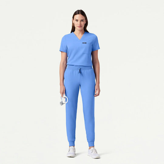 Jaanuu Scrubs Women's Rhena Slim 1-Pocket Scrub Top Ceil Blue | scrub-supply.com