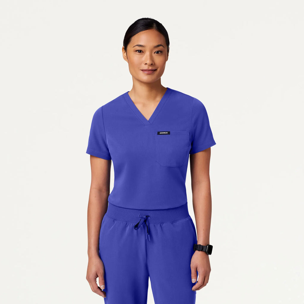 Jaanuu Scrubs Women's Rhena Slim Essential 1-Pocket Scrub Top Moon Blue | scrub-supply.com