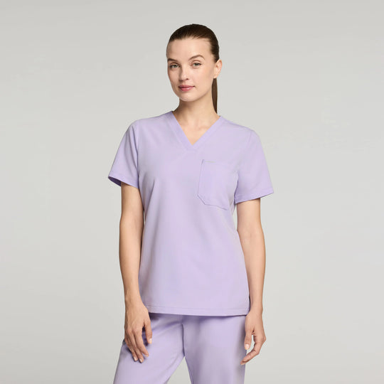 Jaanuu Scrubs Women's Rhena Slim 1-Pocket Scrub Top Lavender | scrub-supply.com