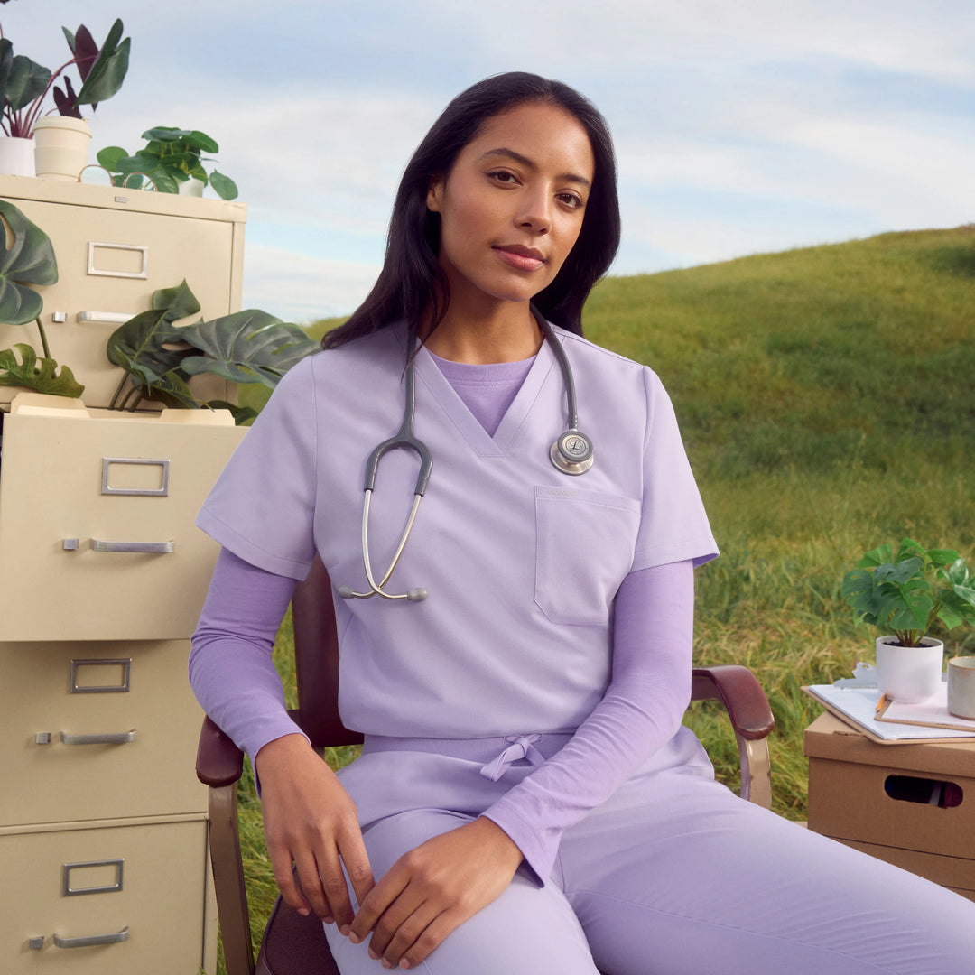 Jaanuu Scrubs Women's Rhena Slim 1-Pocket Scrub Top Lavender | scrub-supply.com