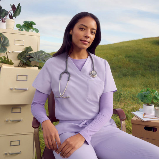 Jaanuu Scrubs Women's Rhena Slim 1-Pocket Scrub Top Lavender | scrub-supply.com
