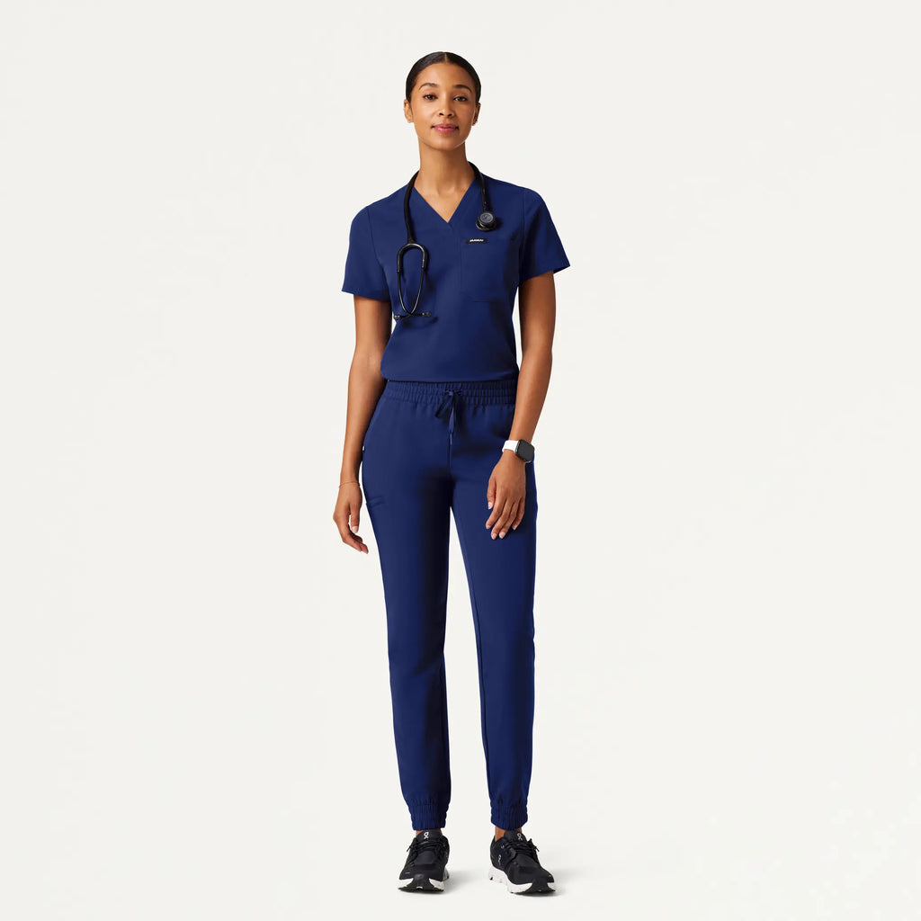 Jaanuu Scrubs Women's Rhena Slim Essential 1-Pocket Scrub Top Navy Blue | scrub-supply.com