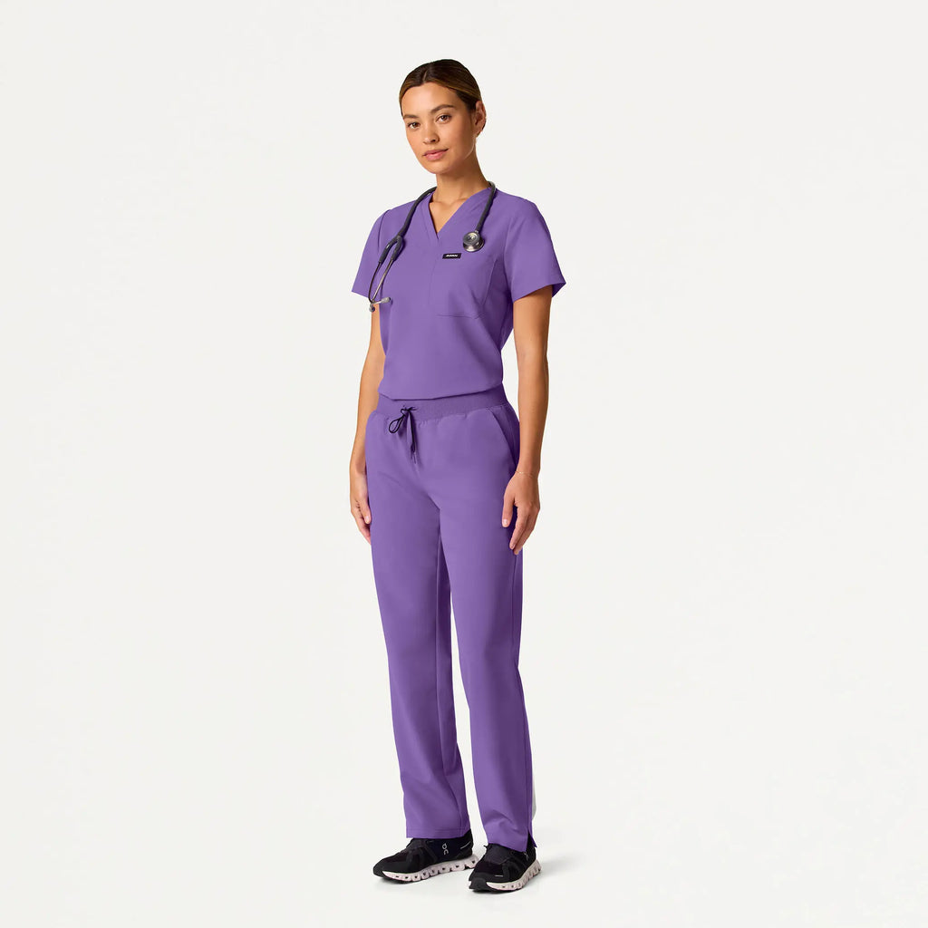 Jaanuu Scrubs Women's Rhena Slim Essential 1-Pocket Scrub Top Violet | scrub-supply.com