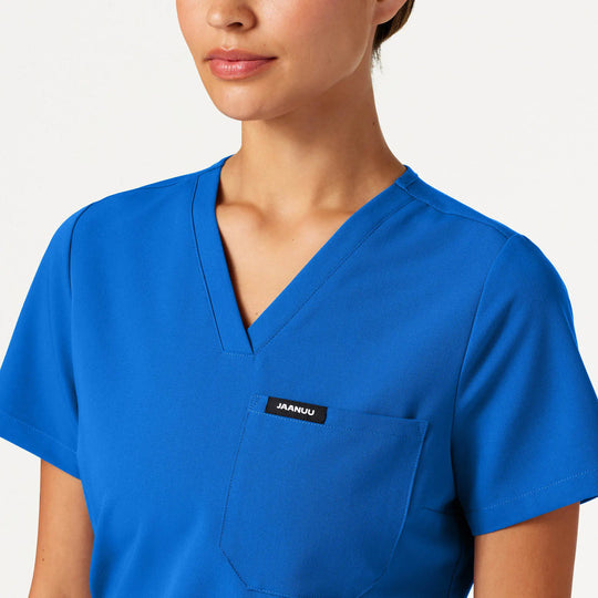 Jaanuu Scrubs Women's Rhena Slim 1-Pocket Scrub Top Royal Blue | scrub-supply.com