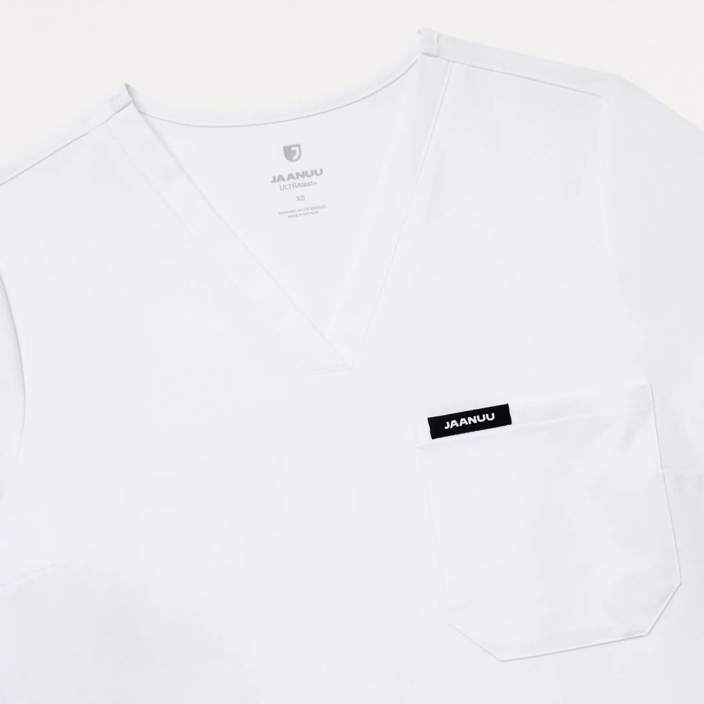 Jaanuu Scrubs Women's Rhena Slim Essential 1-Pocket Scrub Top White | scrub-supply.com