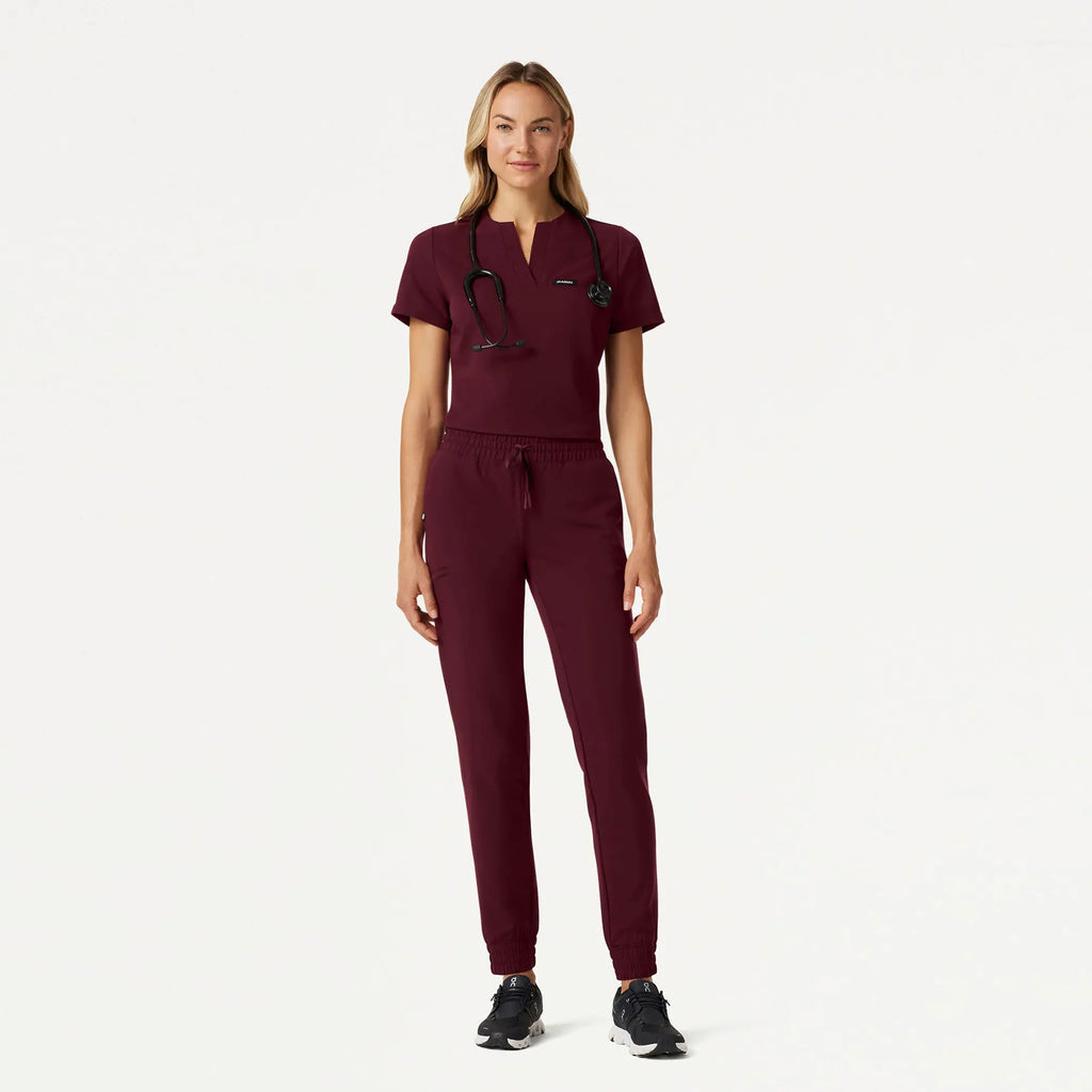 Jaanuu Scrubs Women's Andra Slim 1-Pocket Scrub Top Burgundy | scrub-supply.com