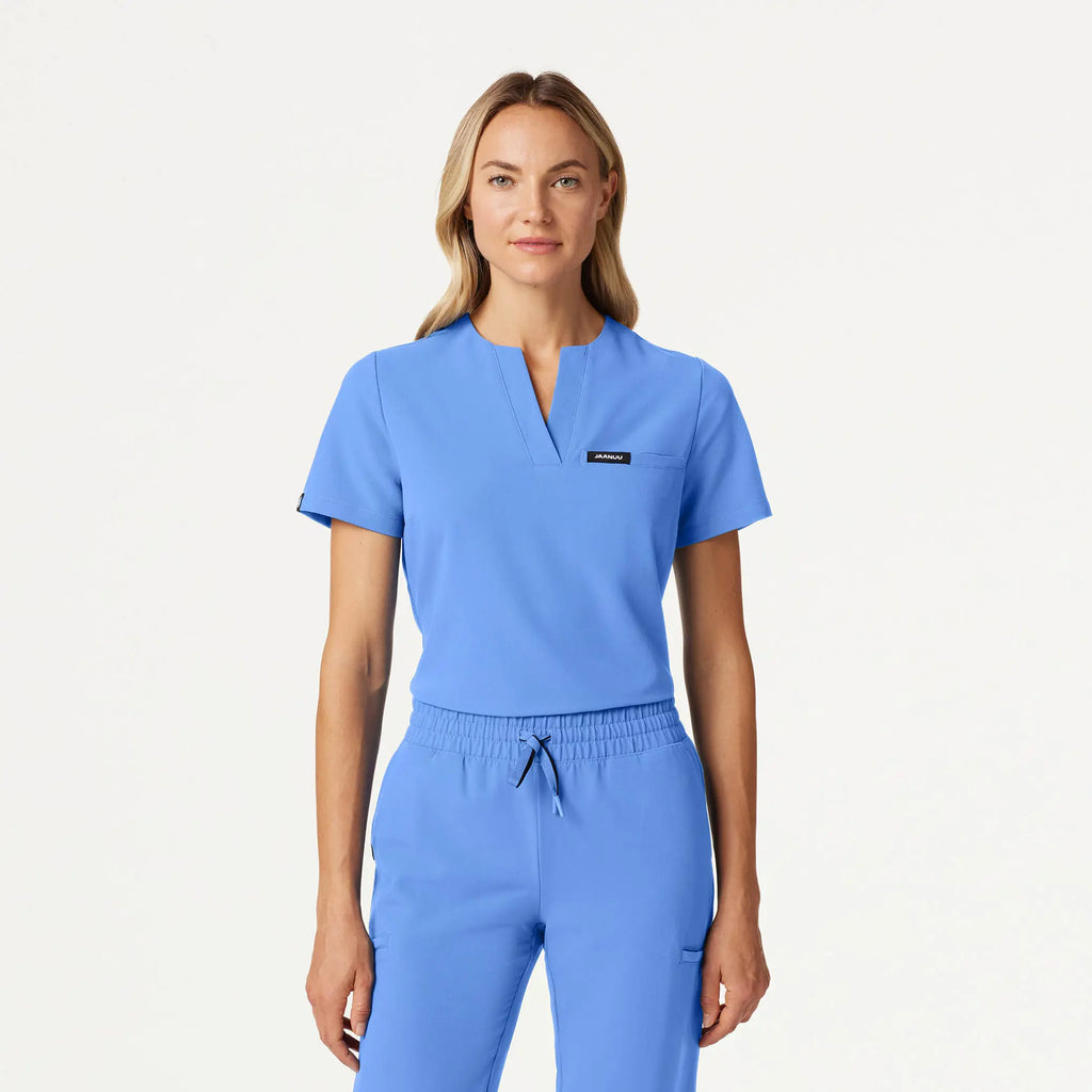 Jaanuu Scrubs Women's Andra Slim 1-Pocket Scrub Top Ceil Blue | scrub-supply.com