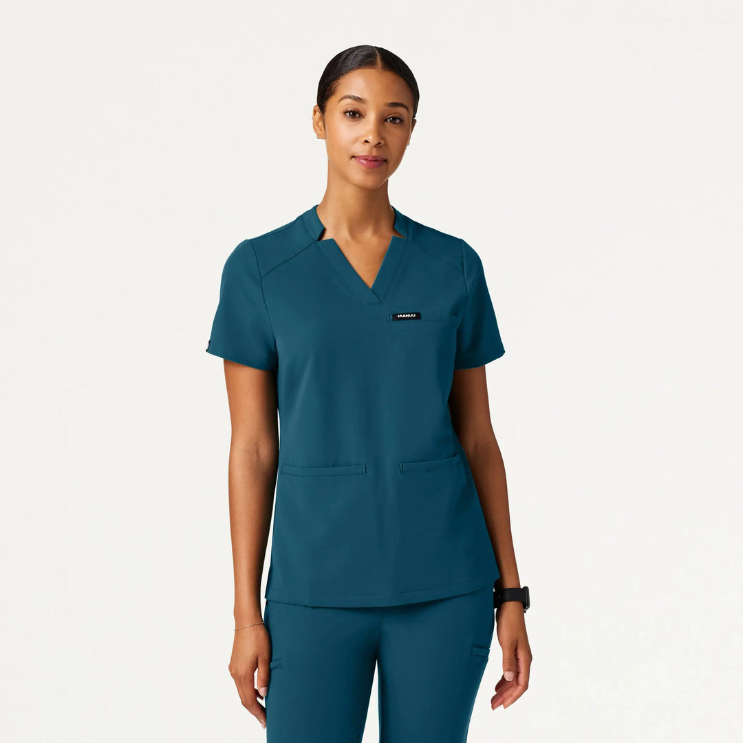 Jaanuu Scrubs Women's Helia Slim Notched V-Neck Scrub Top Caribbean Blue | scrub-supply.com
