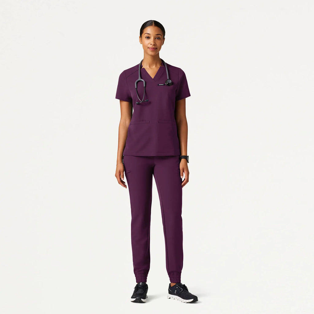 Jaanuu Scrubs Women's Helia Slim Notched V-Neck Scrub Top Dark Amethyst | scrub-supply.com