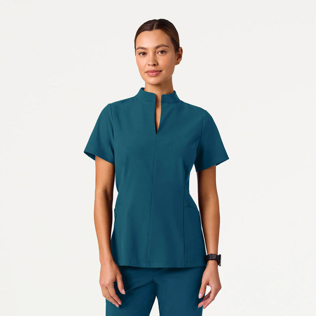 Jaanuu Scrubs Women's Aria Fit & Flare ULTRAlite™ Scrub Top Caribbean Blue | scrub-supply.com
