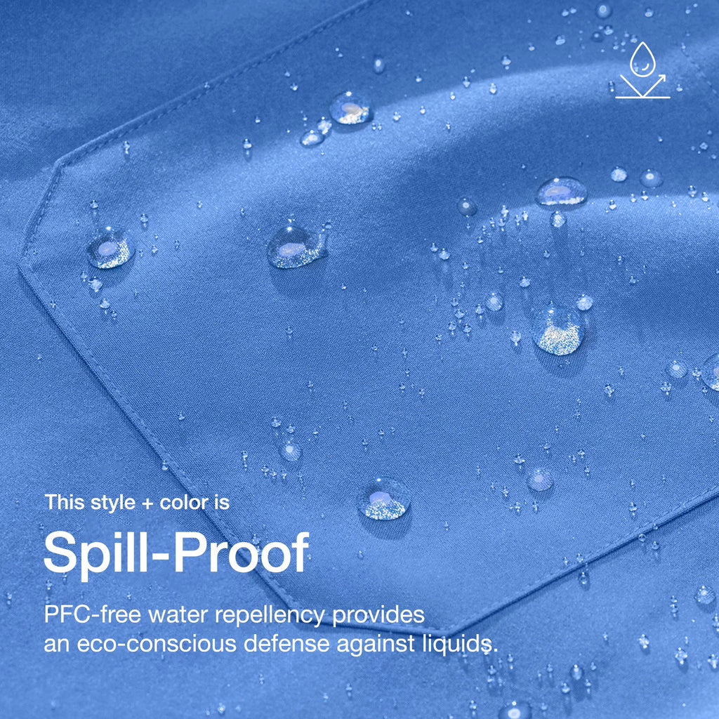 Jaanuu Scrubs Women's Aria Fit & Flare ULTRAlite™ Scrub Top Ceil Blue | scrub-supply.com