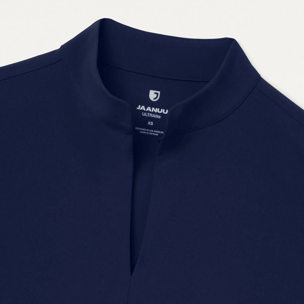 Jaanuu Scrubs Women's Aria Fit & Flare ULTRAlite™ Scrub Top Midnight Navy | scrub-supply.com