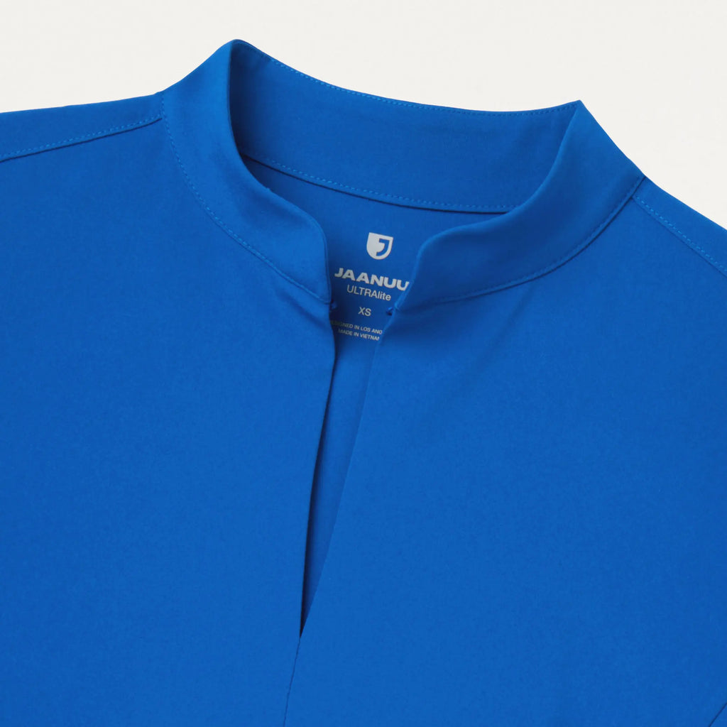 Jaanuu Scrubs Women's Aria Fit & Flare ULTRAlite™ Scrub Top Royal Blue | scrub-supply.com