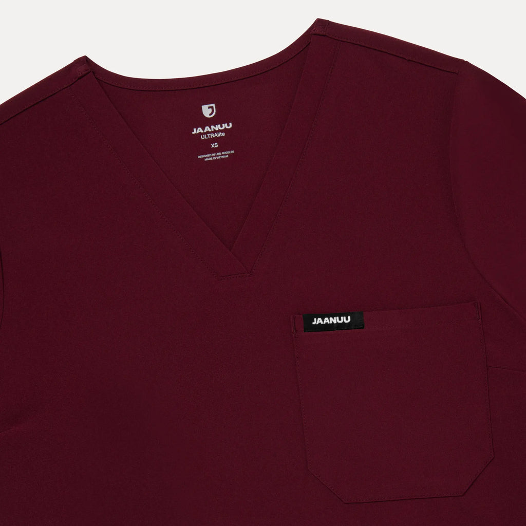 Jaanuu Scrubs Women's Rhena Slim ULTRAlite™ 1-Pocket Scrub Top Burgundy | scrub-supply.com