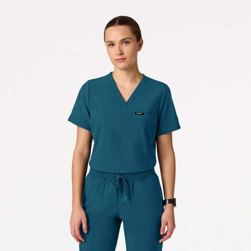 Jaanuu Scrubs Women's Rhena Slim ULTRAlite™ 1-Pocket Scrub Top Caribbean Blue | scrub-supply.com