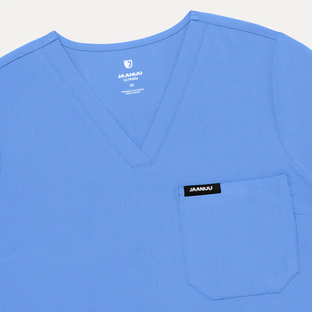 Jaanuu Scrubs Women's Rhena Slim ULTRAlite™ 1-Pocket Scrub Top Ceil Blue | scrub-supply.com