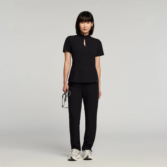 Jaanuu Scrubs Women's Aria Fit & Flare Scrub Top Black | scrub-supply.com