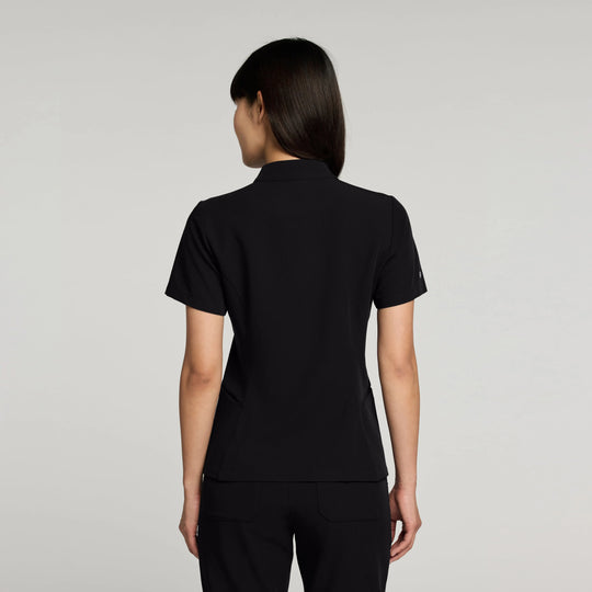 Jaanuu Scrubs Women's Aria Fit & Flare Scrub Top Black | scrub-supply.com