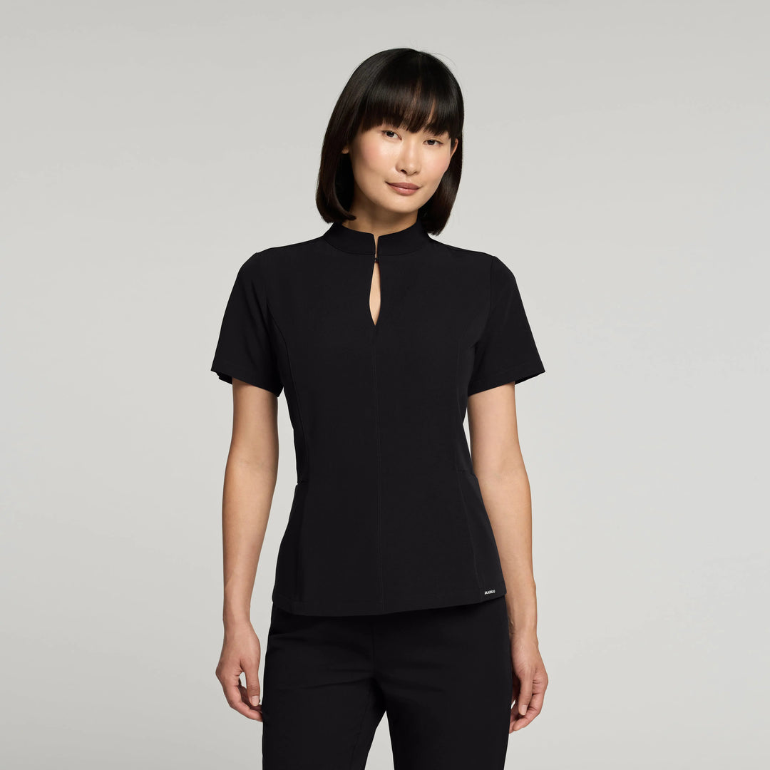 Jaanuu Scrubs Women's Aria Fit & Flare Scrub Top Black | scrub-supply.com
