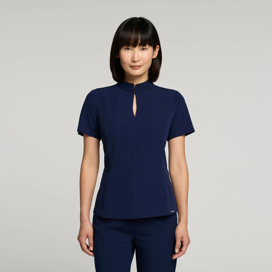 Jaanuu Scrubs Women's Aria Fit & Flare Scrub Top Midnight Navy | scrub-supply.com