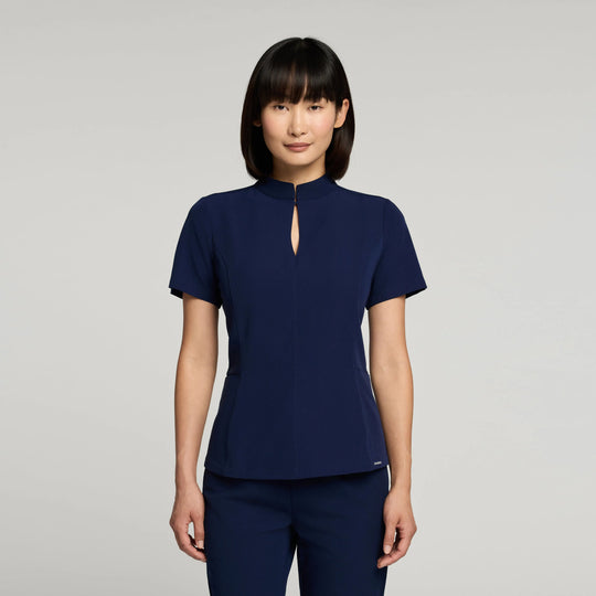 Jaanuu Scrubs Women's Aria Fit & Flare Scrub Top Midnight Navy | scrub-supply.com
