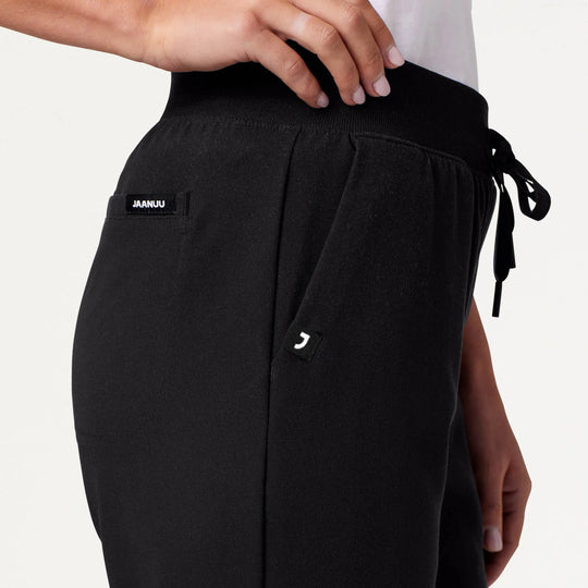 Jaanuu Scrubs Women's Xenos Essential Knit-Waist Scrub Pant Black | scrub-supply.com