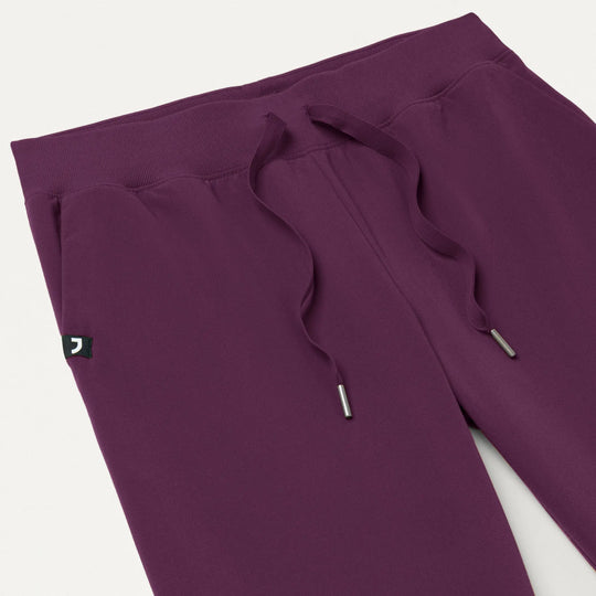 Jaanuu Scrubs Women's Xenos Essential Knit-Waist Scrub Pant Deep Eggplant | scrub-supply.com