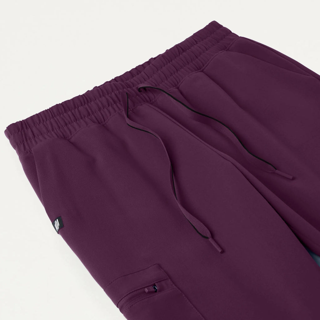 Jaanuu Scrubs Women's Neo Everyday Cargo Scrub Jogger Dark Amethyst | scrub-supply.com