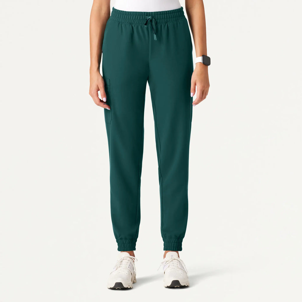 Jaanuu Scrubs Women's Neo Everyday Cargo Scrub Jogger Midnight Green | scrub-supply.com