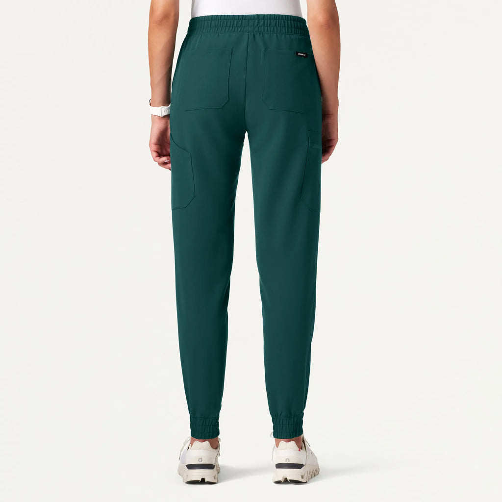 Jaanuu Scrubs Women's Neo Everyday Cargo Scrub Jogger Midnight Green | scrub-supply.com