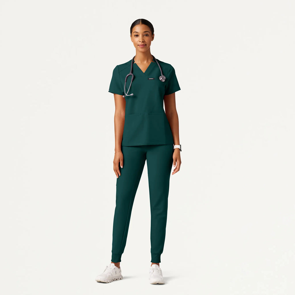 Jaanuu Scrubs Women's Silex Slim Knit-Waist Scrub Jogger Midnight Green | scrub-supply.com