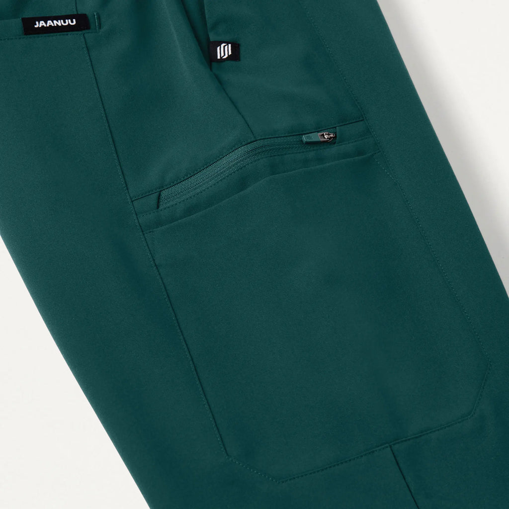 Jaanuu Scrubs Women's Payla 8-Pocket High Waisted Scrub Pant Midnight Green | scrub-supply.com