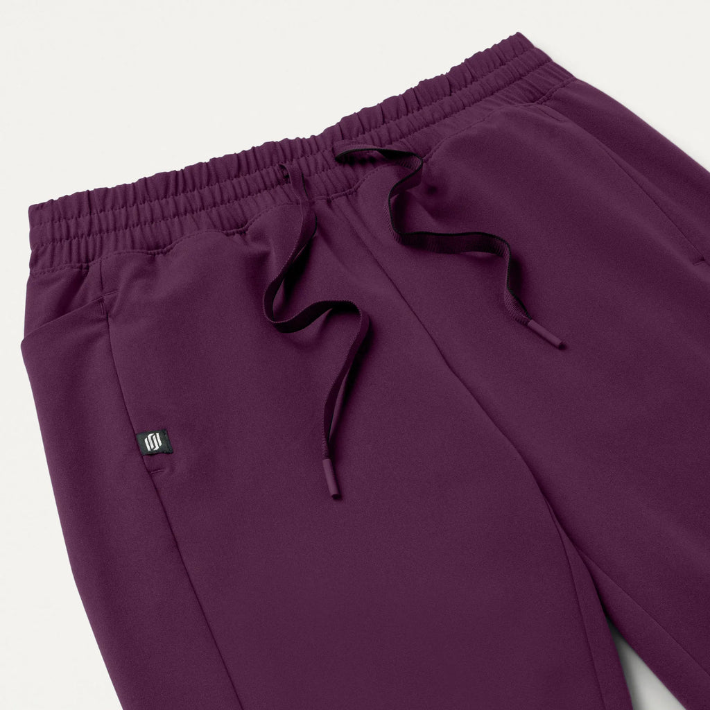 Jaanuu Scrubs Women's Effie Slim 6-Pocket Scrub Pant Dark Amethyst | scrub-supply.com